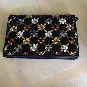 Edgy Black and Gold Skull Clutch